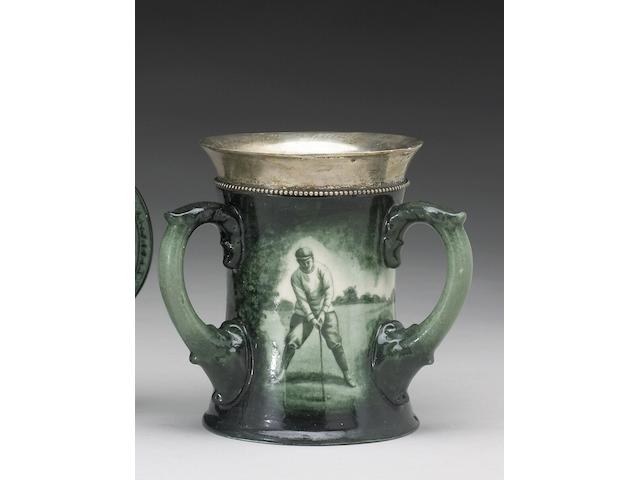 A Lenox porcelain three-handled toasting mug, circa 1898,