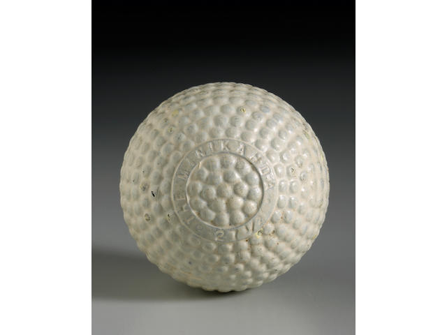 An unlisted extremely rare 'The Minikahda 27 1/2' bramble patterned gutty golf ball, circa 1898,