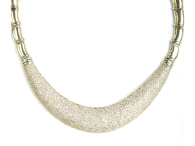 A diamond and 18 karat yellow gold necklace