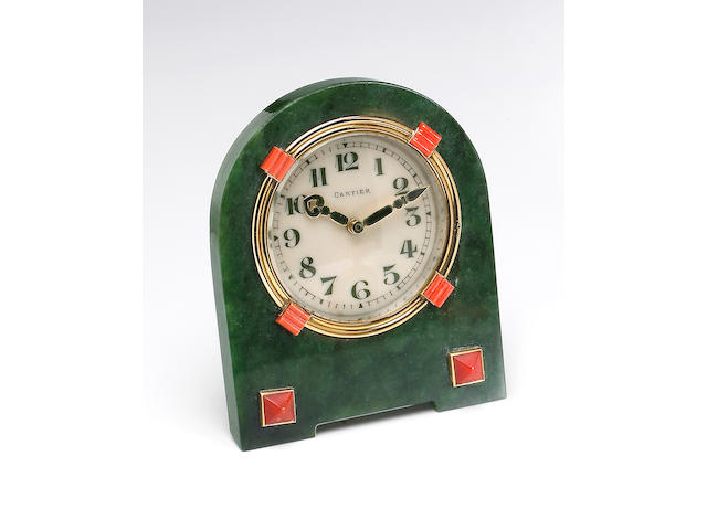 Cartier. An fine and rare nephrite, coral, gold and brass eight day table strut clockNo.2380, 4140, 1920s