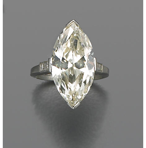 A diamond and platinum solitaire ring