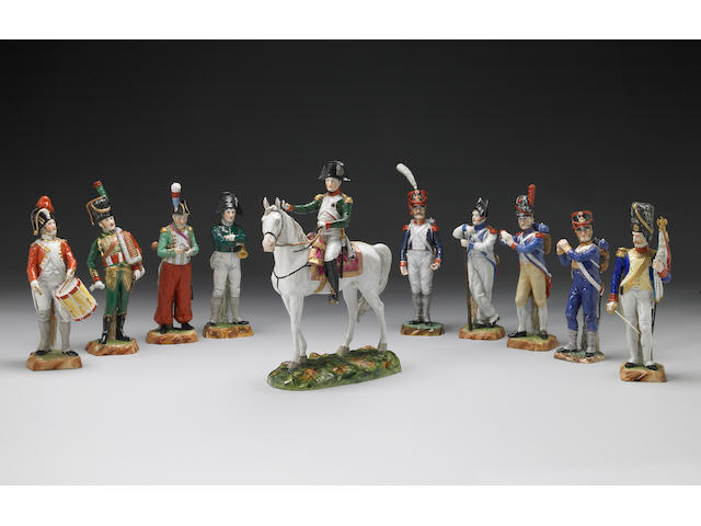 A group of ten porcelain figures, one modelled as Napoleon on horseback