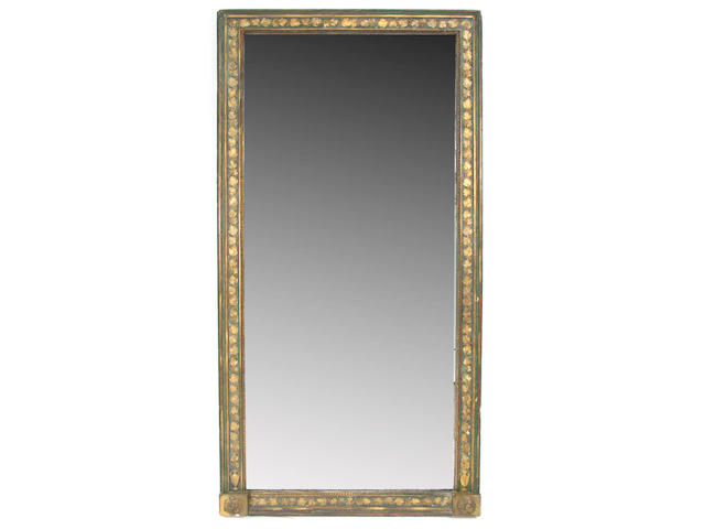 A Louis XVI style carved wood and gesso parcel gilt mirror