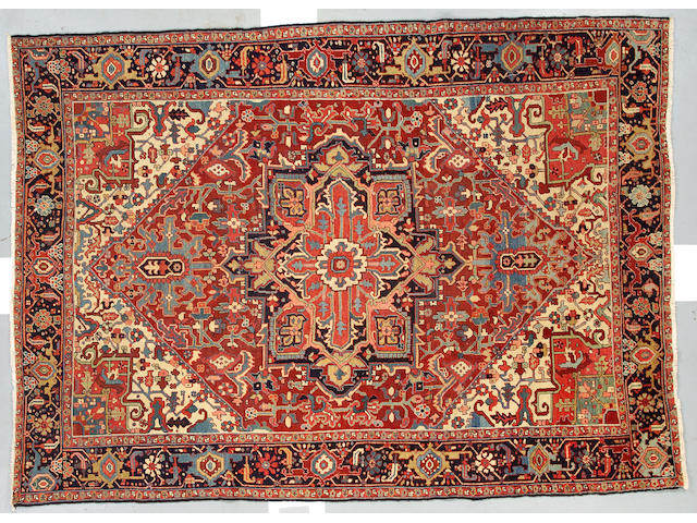 A Heriz Carpet size approximately 10ft 9in x 7ft 10in