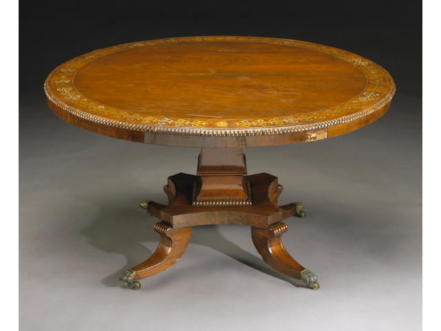 A Regency brass-inlaid rosewood breakfast table