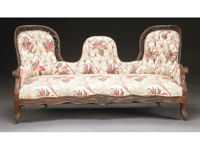 A Victorian pierce-carved rosewood sofa