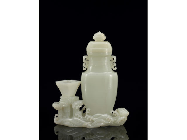 A finely carved white jade vase group 18th Century