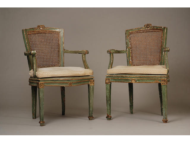A set of five Italian Neoclassical green-painted arm-chairs and two later matching arm chairs