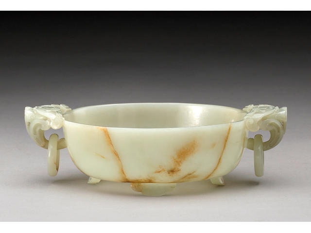 A pale greenish white jade shallow  bowl