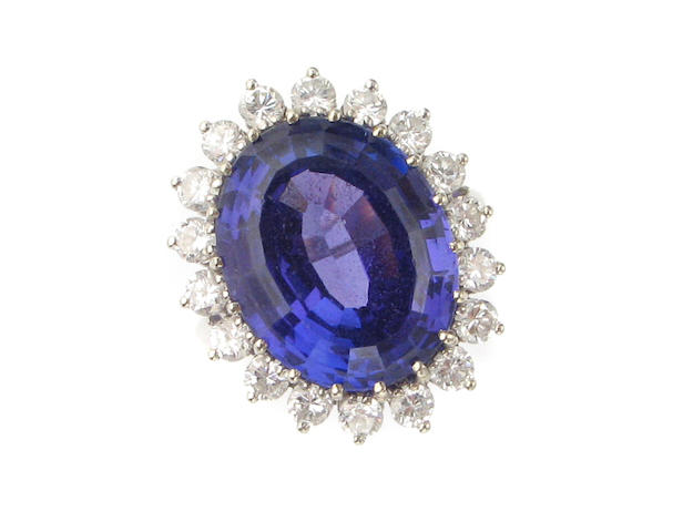 A tanzanite, diamond and fourteen karat white gold ring,