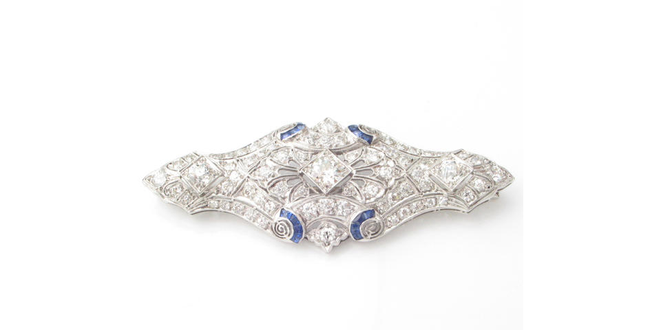 A diamond, sapphire and platinum brooch,