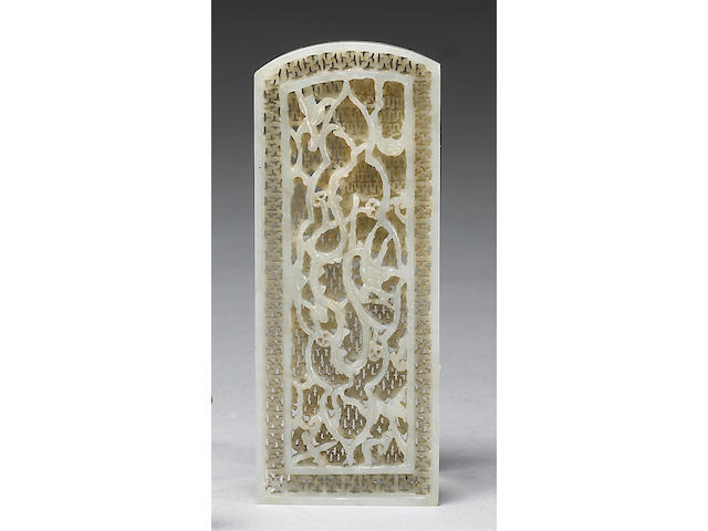 A pale celadon nephrite reticulated belt plaque Late Ming Dynasty