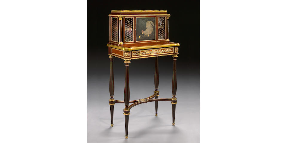 A Louis XVI style gilt bronze mounted amboyna inlaid mahogany bonheur du jour