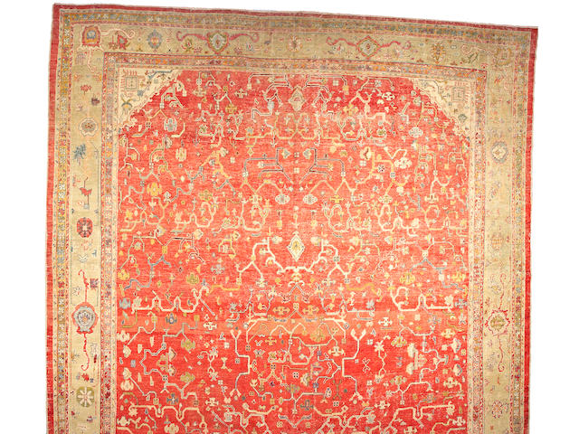 An Oushak carpet West Anatolia, size approximately 16ft. 4in. x 23ft. 10in.