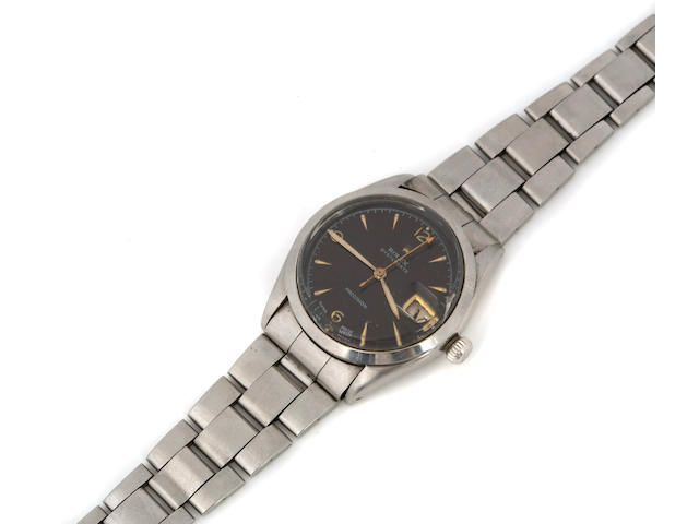Rolex. A stainless steel calendar bracelet watch with black dialOysterDate, Ref.6294, made in 1954