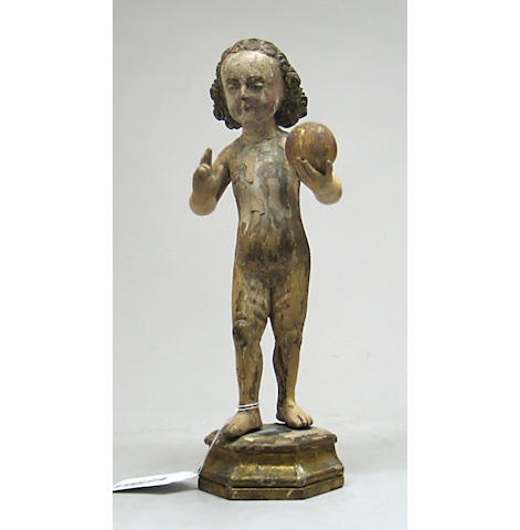 A European carved, polychrome, and parcel gilt figure of the infant Christ