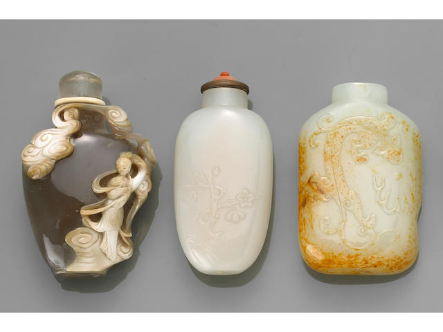 One agate and two white jade snuff bottles