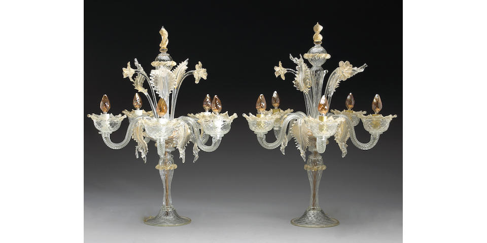 A pair of Murano gold flecked colorless glass five light candelabra
