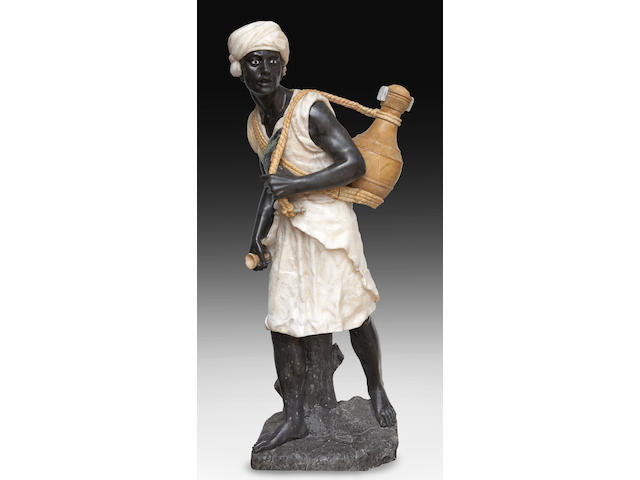 A carved marble and alabaster figure of a blackamoor