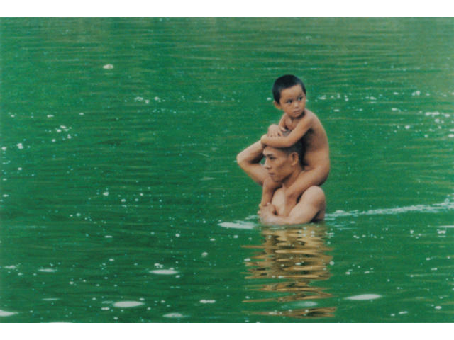 Zhang Huan (Chinese, born 1965) To raise the water level in a fishpond (Waterchild), 1997 27 x 40in (69 x 102cm)