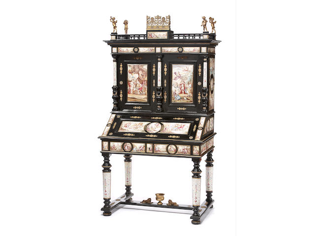 A fine Continental gilt-bronze and enamel-mounted ebonized cabinet