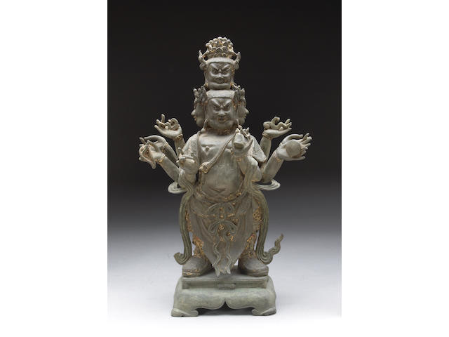 A  cast bronze standing figure of a guardian deity 18th Century