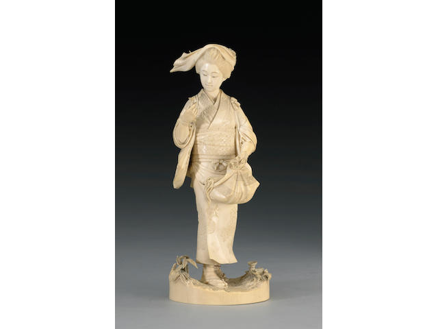 An ivory okimono of a bijin Meiji Period