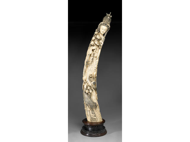 A massive tinted ivory figure of a female immortal 20th Century
