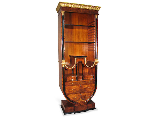 A Biedermeier style walnut secretaire cabinet