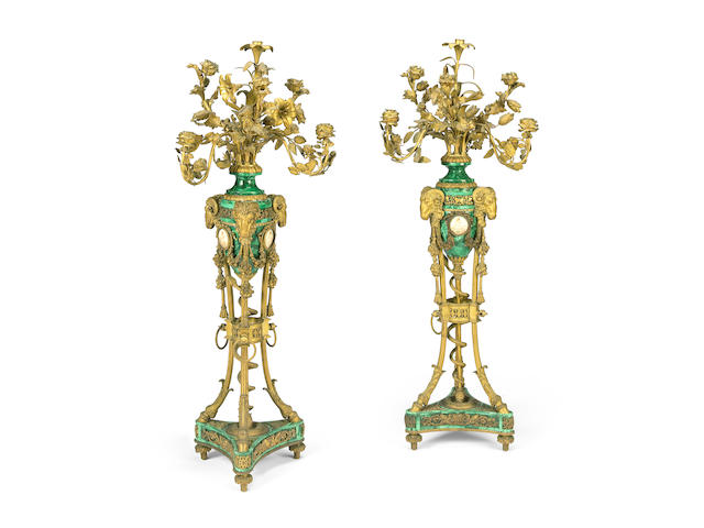 A pair of large Louis XVI style gilt bronze and malachite veneered seven light candelabra  after the model by Pierre-Philippe Thomire 19th century