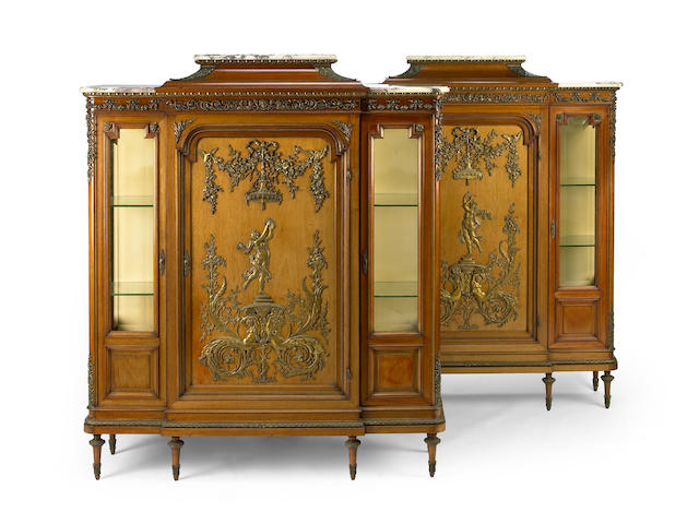 A pair of Louis XVI style gilt bronze mounted mahogany vitrines  fourth quarter 19th century