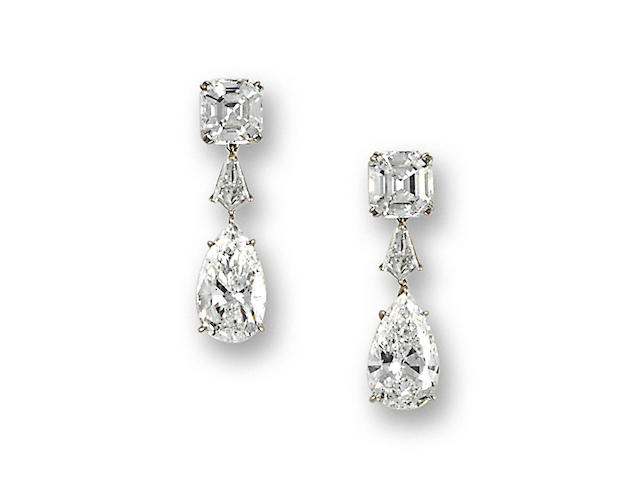 A pair of fine diamond pendant earrings