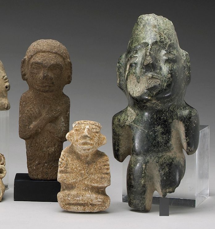 Three Mexican stone figures