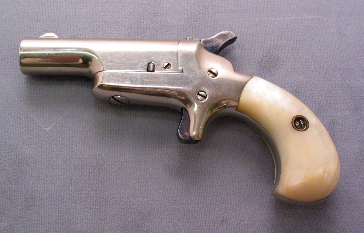 A Colt 3rd Model derringer - auctions & price archive