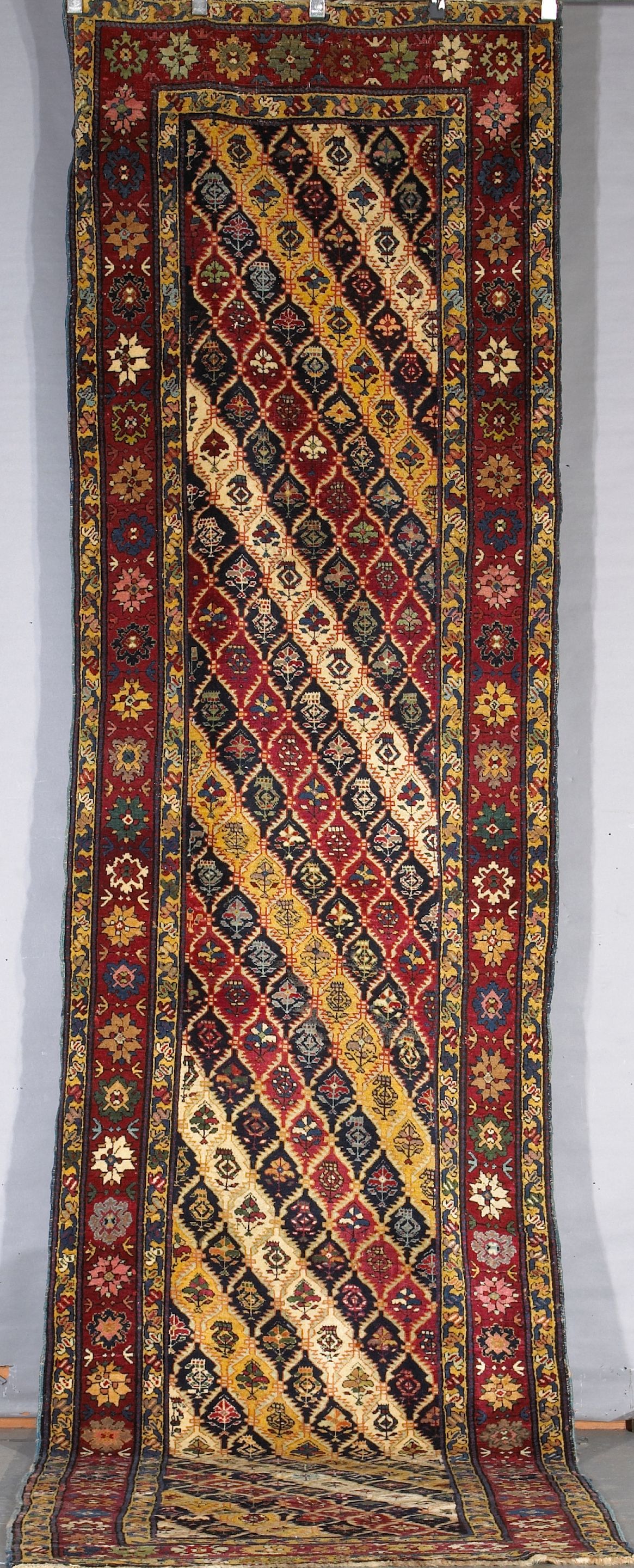 A Karabagh runner size approximately 15ft x 3ft