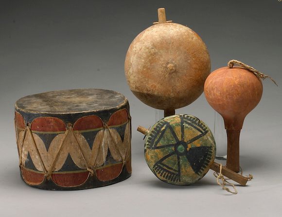 Bonhams : Four Southwest musical instruments: rattles (3), drum