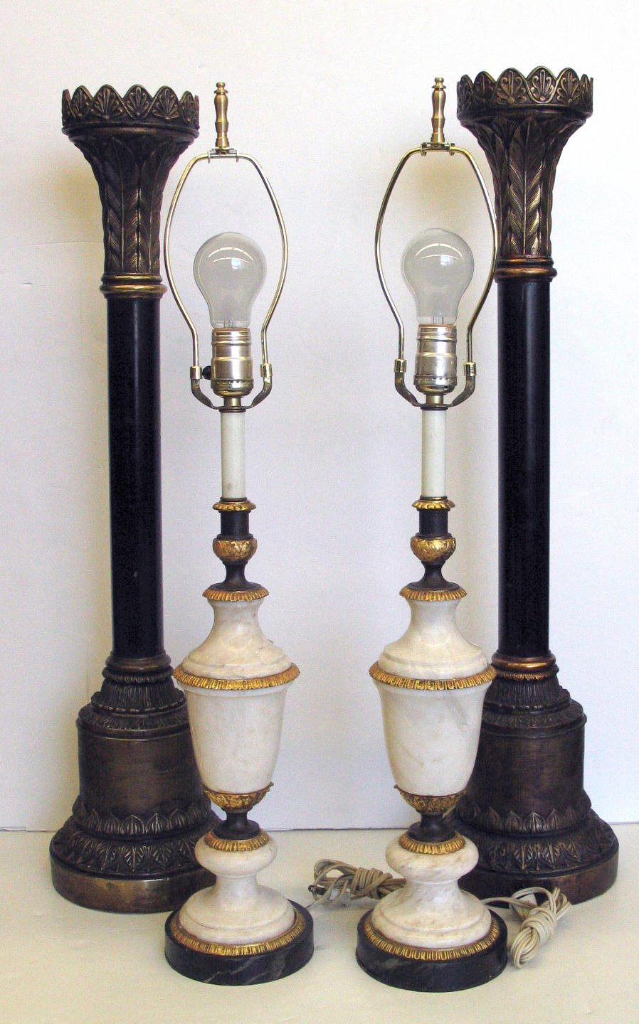 A pair of Neoclassical style gilt and patinated brass mounted white marble...