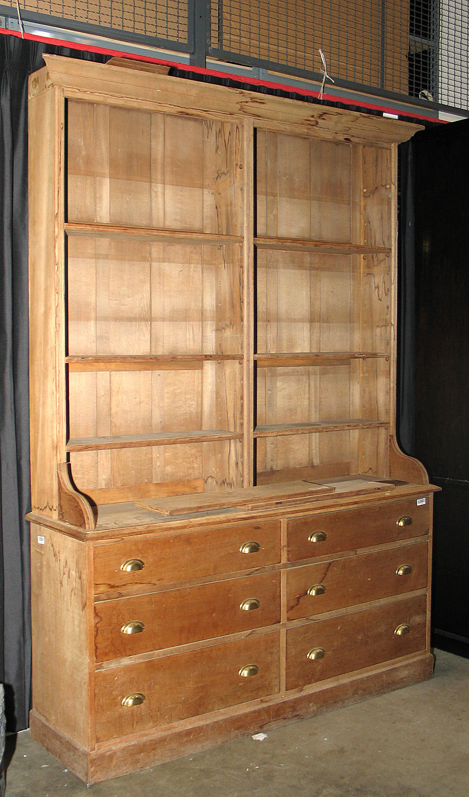 A Provincial pine step back cupboard