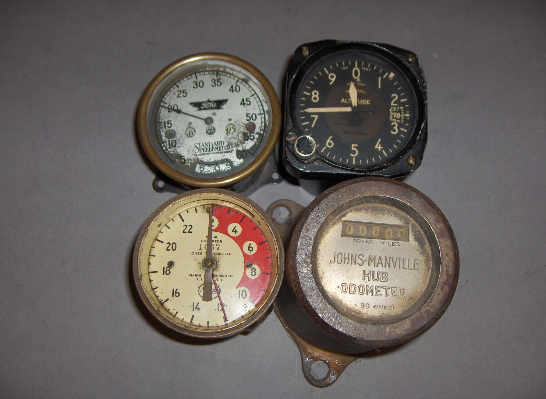 Bonhams Cars : A group of four assorted instruments,