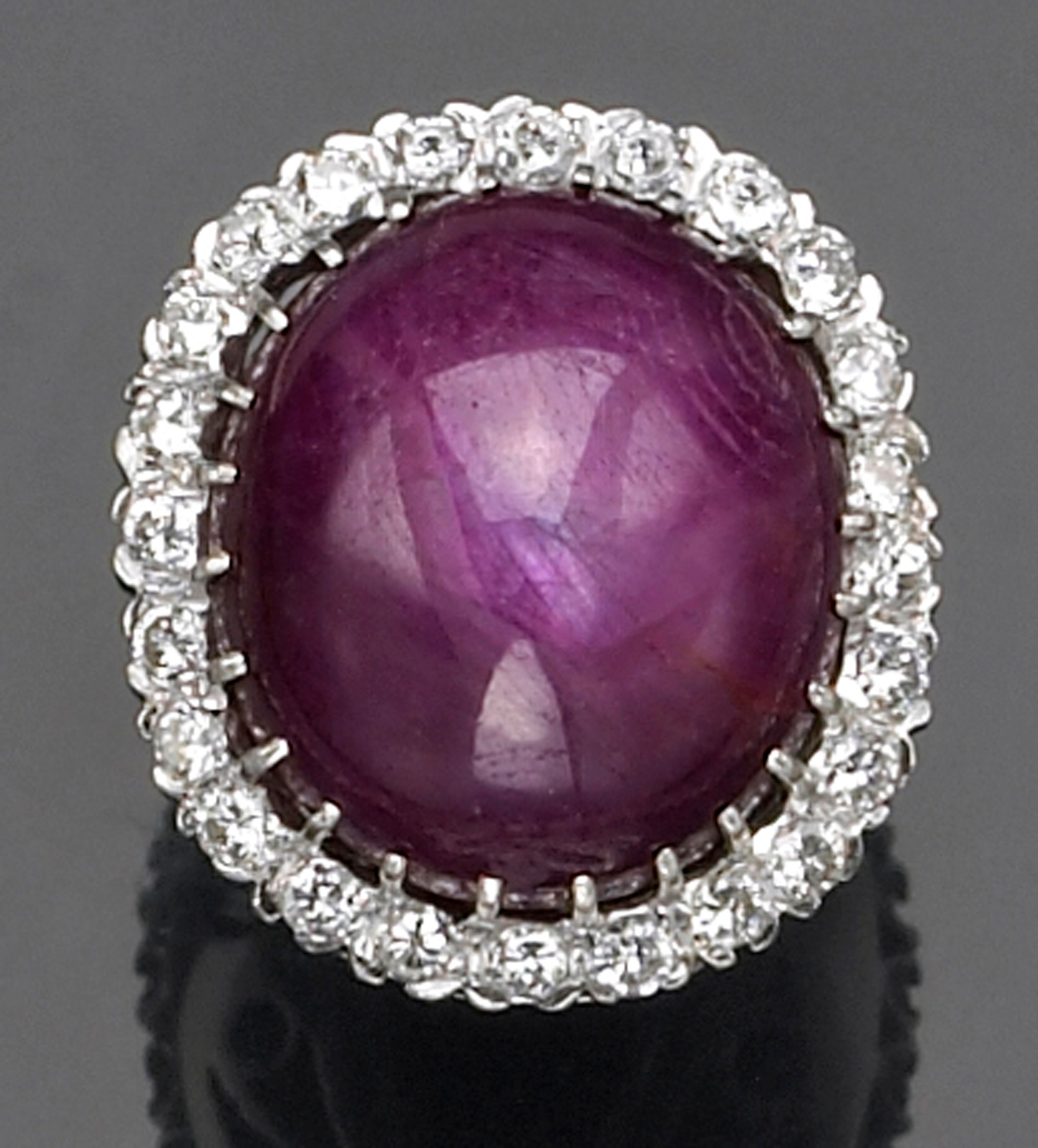 A star ruby, diamond and white gold ring