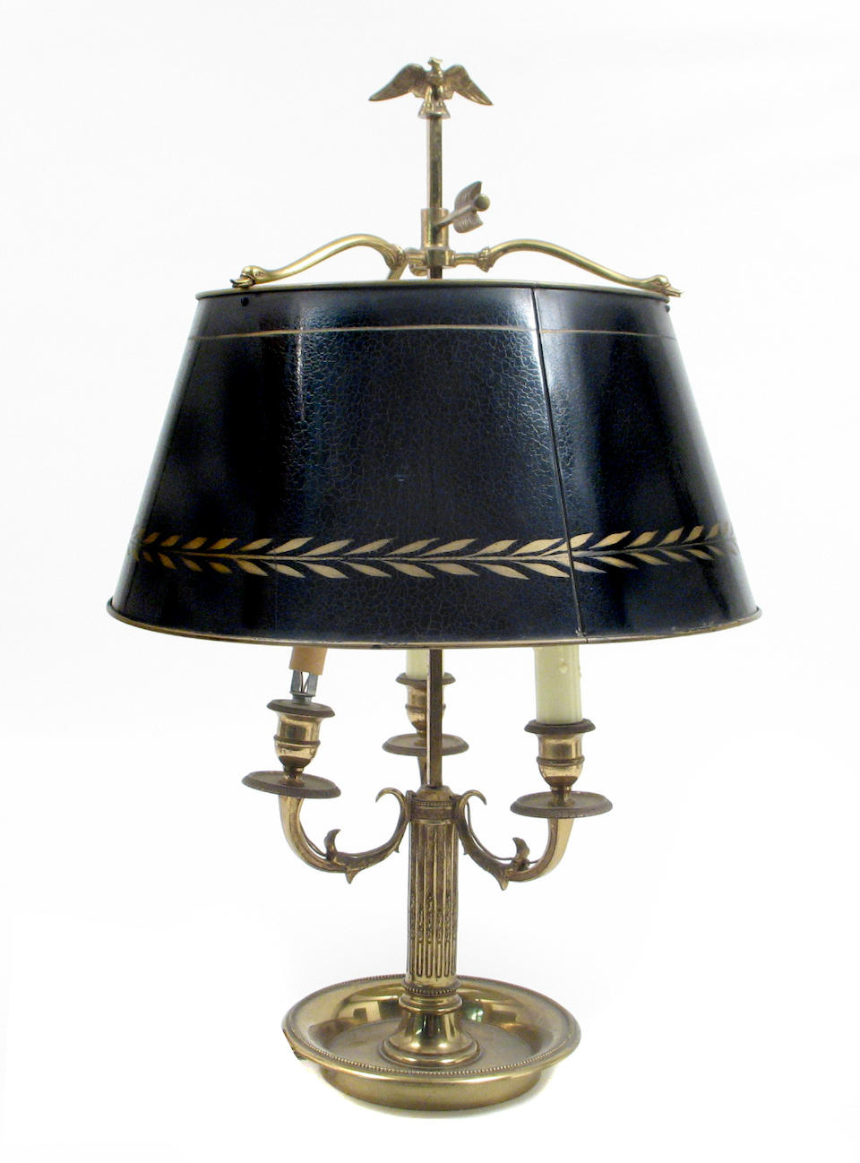 Bonhams : A brass bouillotte lamp with tole shade