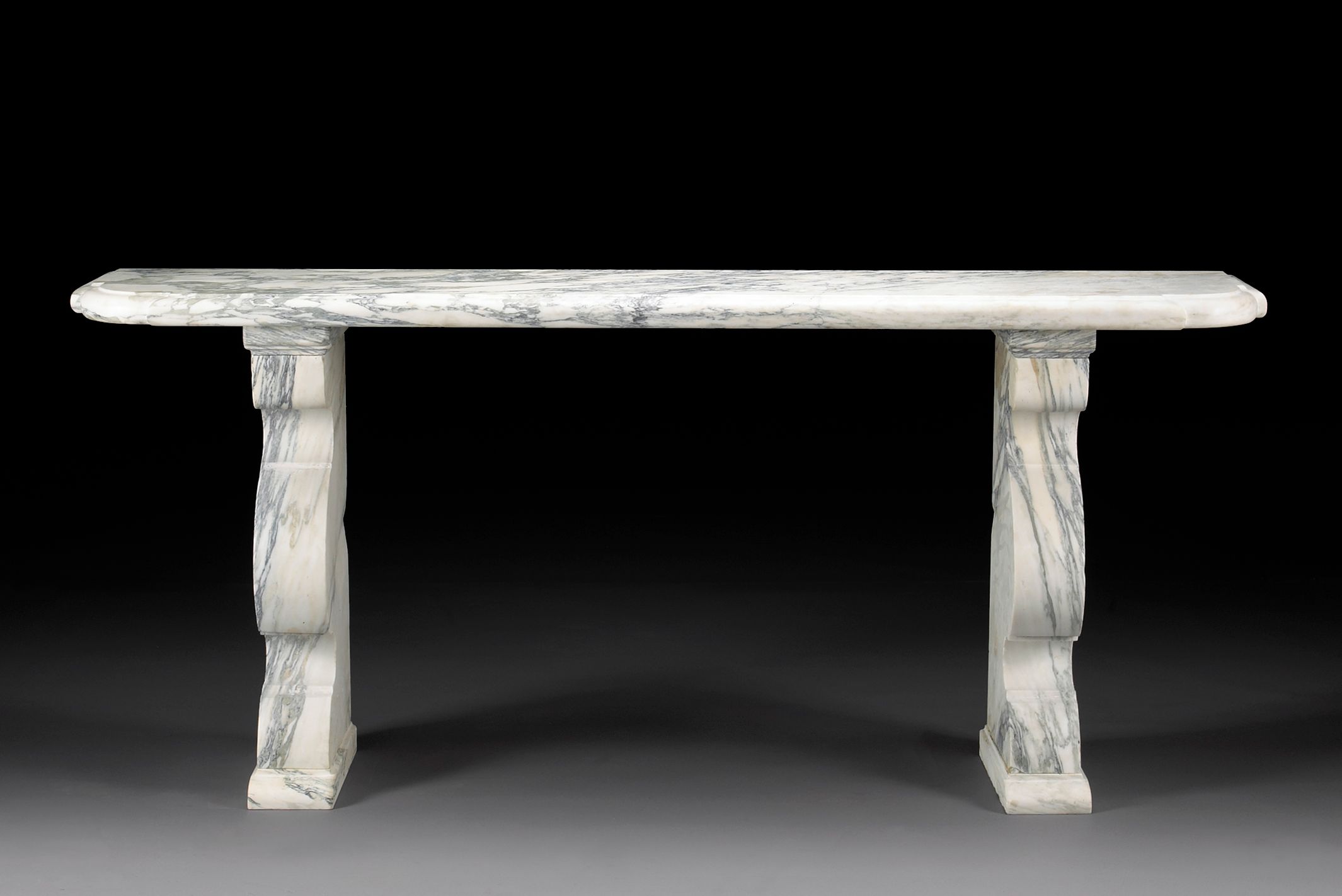 A Baroque style marble console table