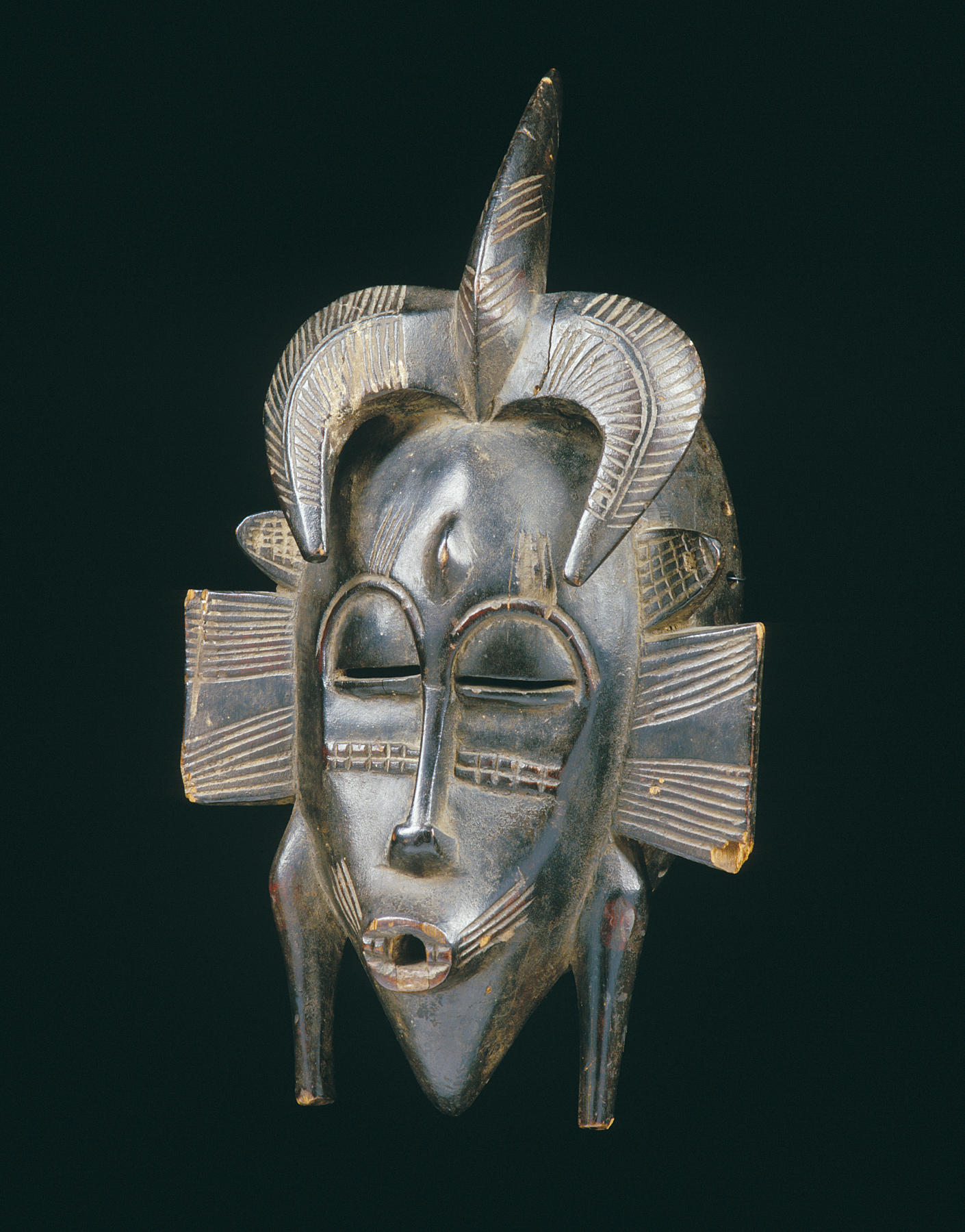 A Senufo facemask, Kpellie