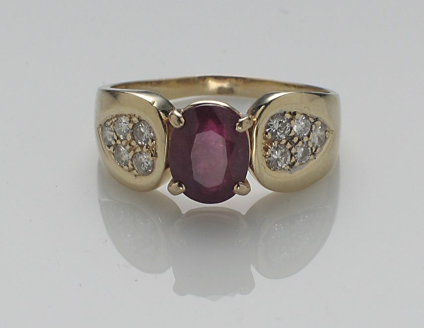 A ruby, diamond and 14k gold ring