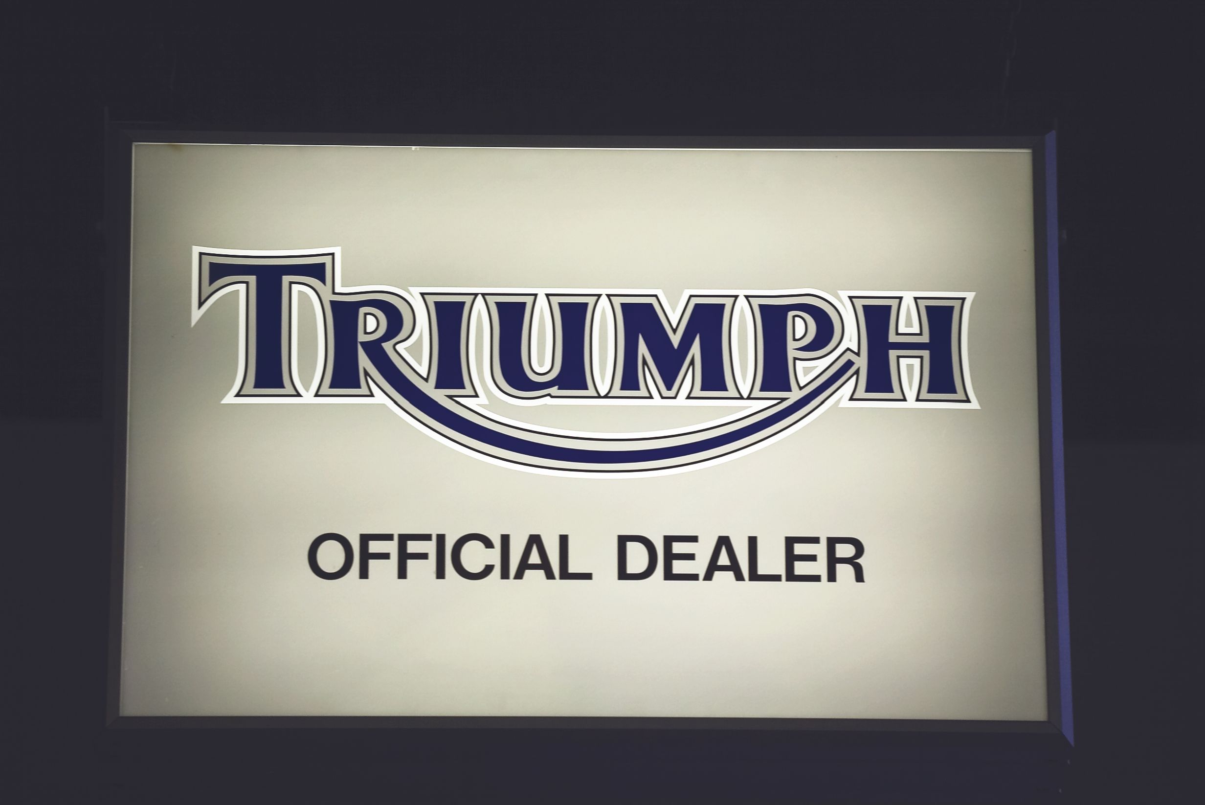 Bonhams Cars : A Triumph illuminated display sign, 38 x 26 x 8in