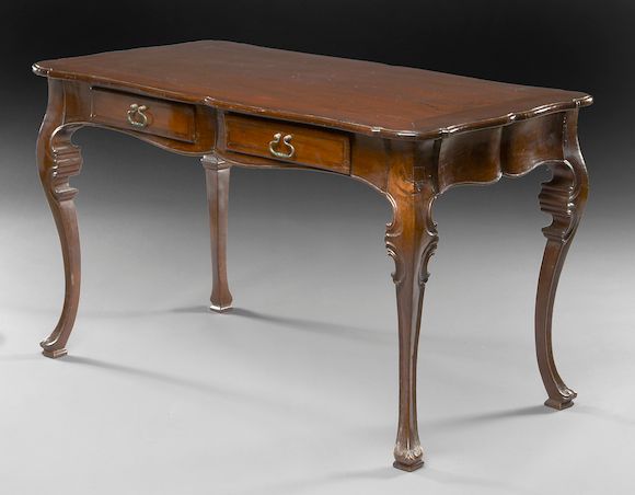 Bonhams : A Portuguese Rococo style walnut writing table