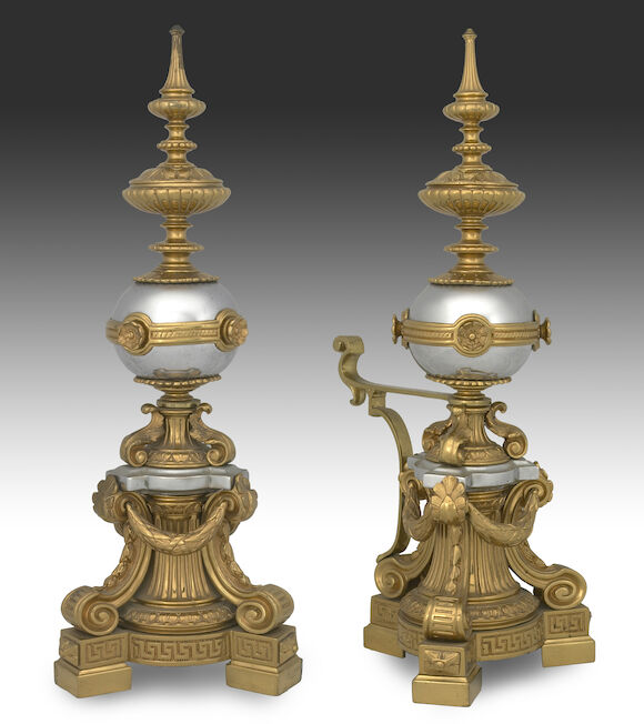 Bonhams : A pair of Louis XVI style gilt and silvered bronze andirons