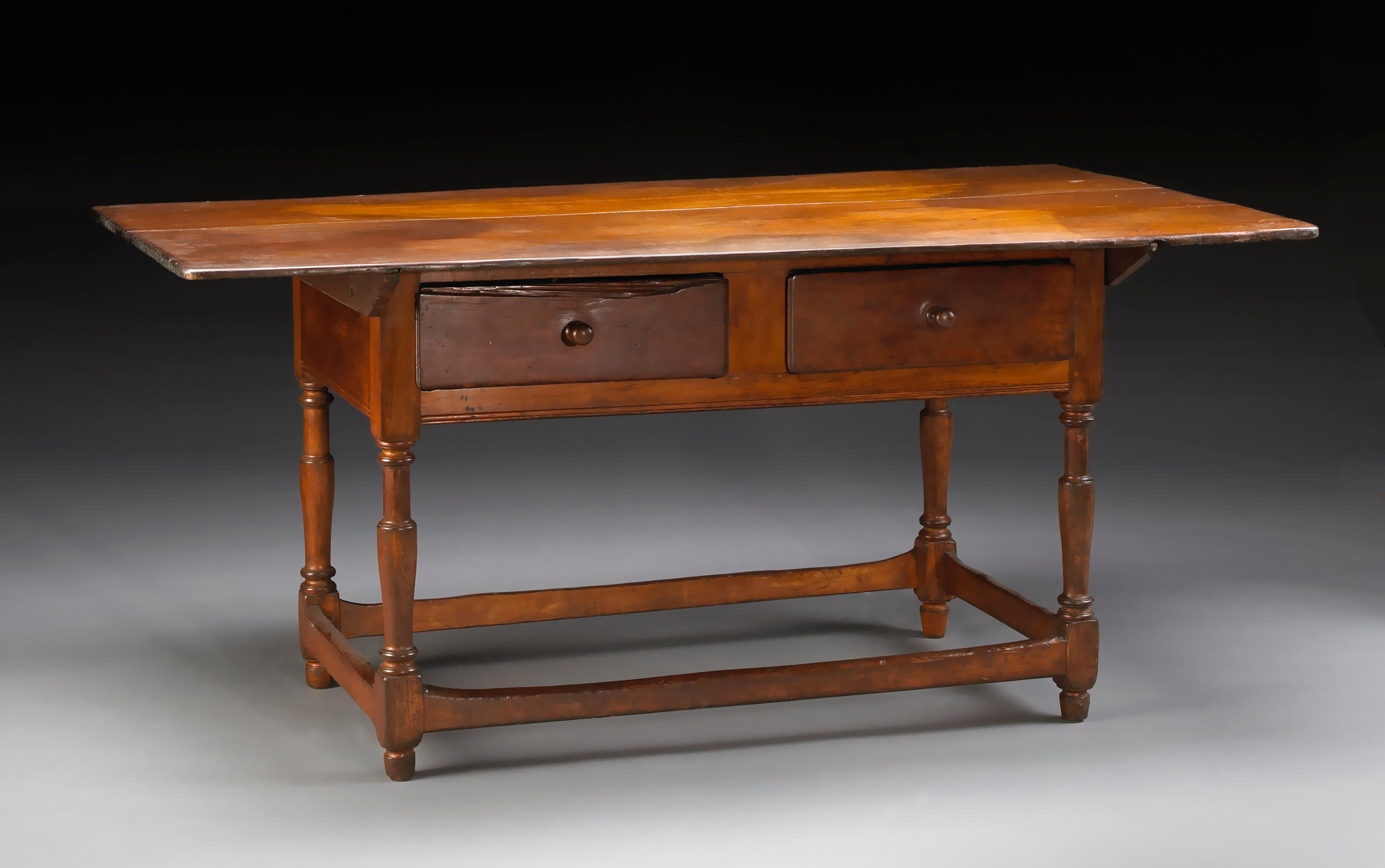A Queen Anne maple and pine tavern table