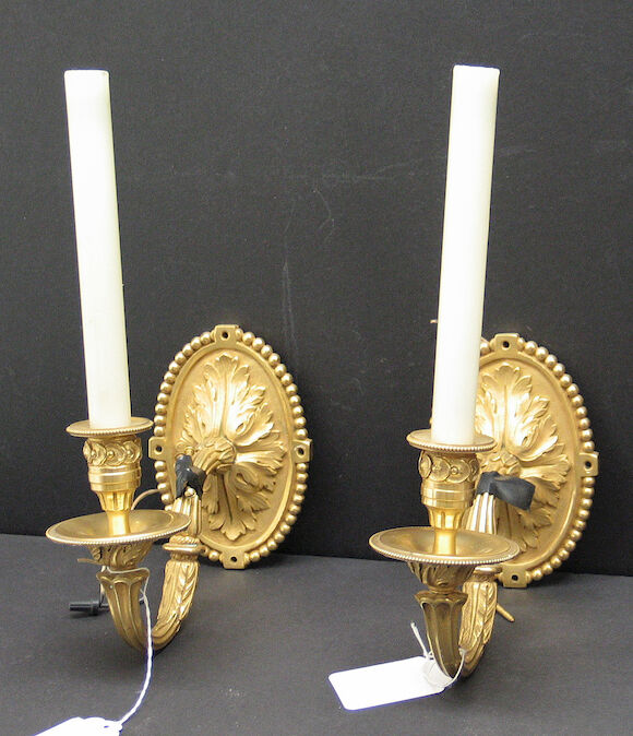 Bonhams : A pair of Louis XVI style gilt bronze single light bras de ...