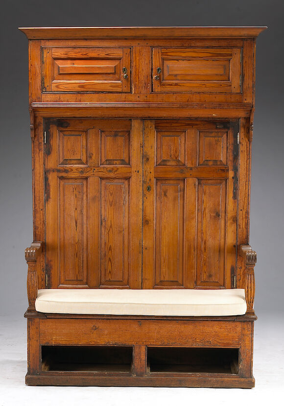 Bonhams : An American provincial bacon cupboard/settle bench